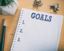 A notebook for someone to list their goals (Success for the Athletic-Minded Man podcast episode #443 (Pt 3 of 5) The Power of Aligned Goals: The Path to Purposeful Success)